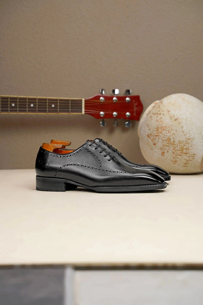 | The Maverick Tan Wingtip Oxford Brogues